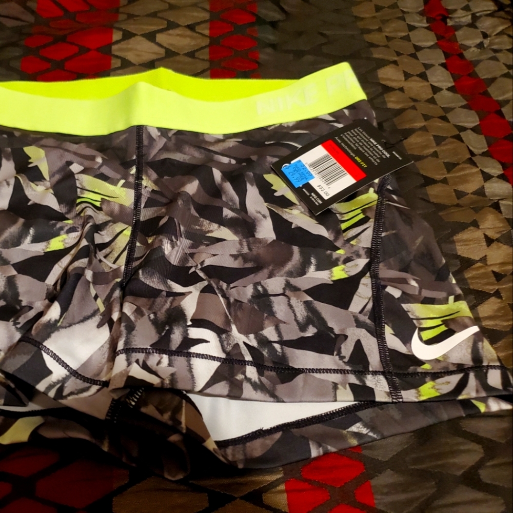 Womens black, yellow and white Nike training shorts size L